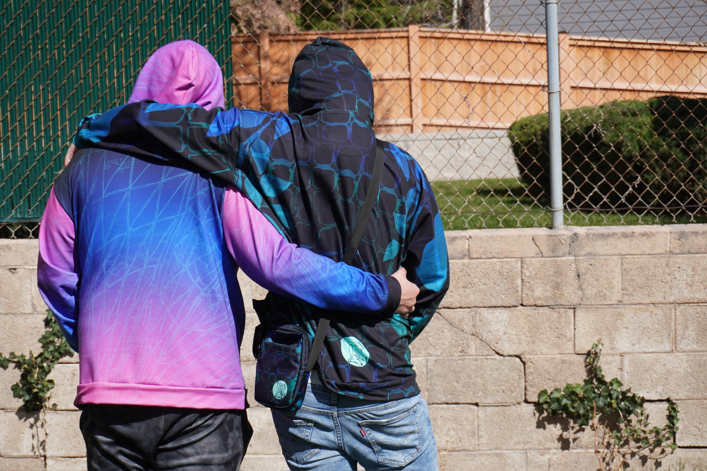 RavenRock hoodie with a textured design, modeled in front of a simple, neutral background.